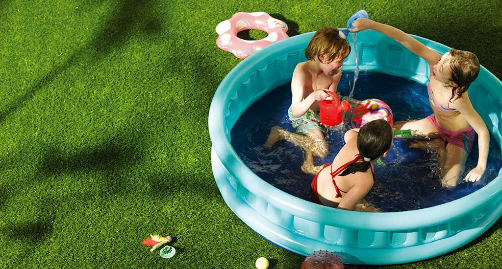 Artificial grass swimming pool